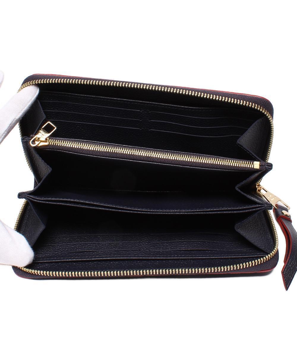 Louis Vuitton Zippy wallet round long Empreinte Monogram zipper Brown
